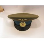 A Cold War era Russian Communist Air Force visor cap with insignia