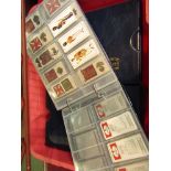 An extensive collection of cigarette cards including approximately 36 collector's albums,