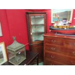 A 19th Century mahogany corner cabinet with inlay and glazed door, cornice a/f,