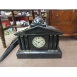 A Victorian black slate mantel clock of architectural form, with key,