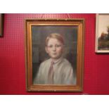 A pastel portrait of young boy, indistinctly signed lower left, gilt framed and glazed,