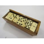A set of Victorian ebony and bone domino's