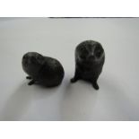 A pair of limited edition bronze hedgehogs,