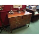 An Edwardian walnut two over two drawer dressing chest,