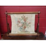 A circa 1840 mahogany tapestry needlepoint work stand with lidded thread box base