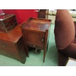 A George III mahogany nightstand the fret handles to raised gallery over a single door and drawer