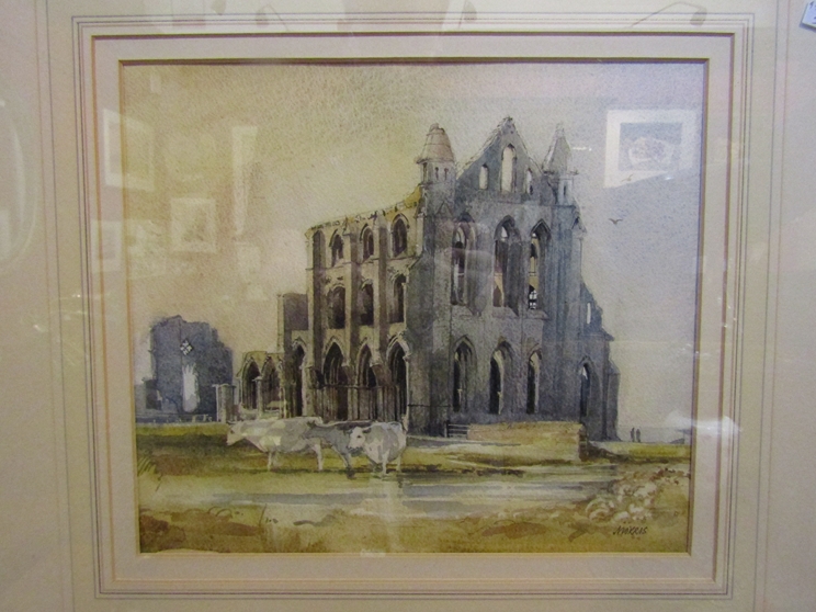 A framed and glazed watercolour of Abbey ruins and cattle, signed MORRIS lower right,