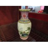 A 20th Century Chinese porcelain vase decorated with mountain temple design,