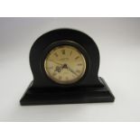 A Looping 15 jewel lever 8 day anti-magnetic Swiss clock in ebony case