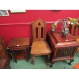 A pair of late Victorian Arts & Crafts oak hall chairs the Cathedral arch top back rest and