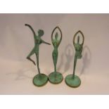 Three verdigris bronze dancing figures