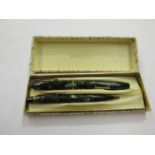 A cased Conway Stewart pen and pencil set