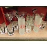 A selection of modern drinking glasses including martini and reindeer design