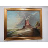 An early 20th Century oil on canvas depicting Cley Windmill, North Norfolk, gilt frame,