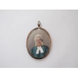 A 19th Century oval miniature on ivory, portrait of a Barrister. Signed Cosway lower right.