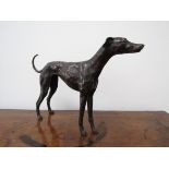 A 2002 bronze figure of a lurcher, signed SEA underneath and No. 4/12 and dated, 30.5cm high x 44.