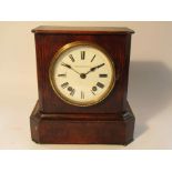 A late 19th Century walnut cased mantel clock with Roman enamelled dial signed Camerer Kuss & Co,