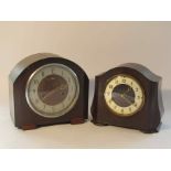 Two mid 20th Century Smith's Enfield striking mantel clocks in oak and bakelite cases,