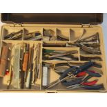 Two toolboxes with contents including pliers, tweezers, screwdrivers, needle files, pin vices,