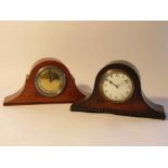 Two Edwardian oak cased timepieces of Napoleon hat form, with Arabic dials,