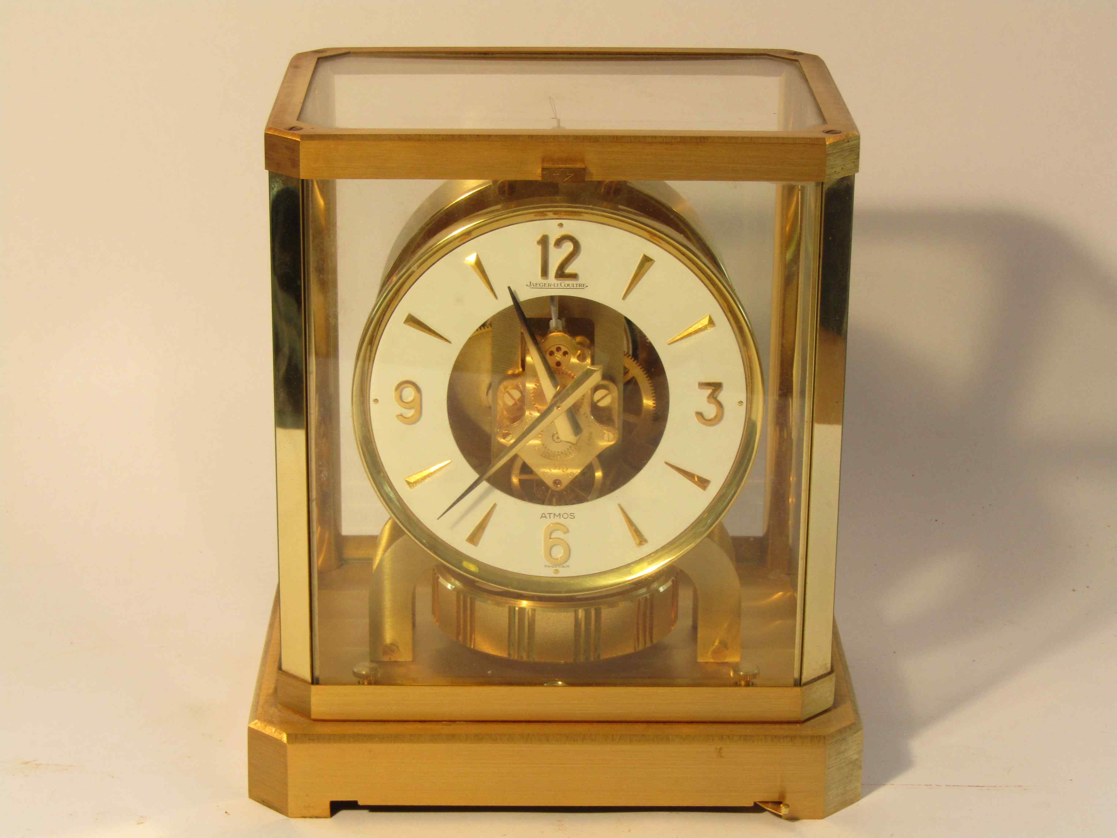 A Jaeger LeCoultre Atmos clock in gilt brass and glazed casing, serial no.