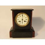A small late 19th Century slate and rouge marble mantel clock with enamelled Roman dial (a/f),