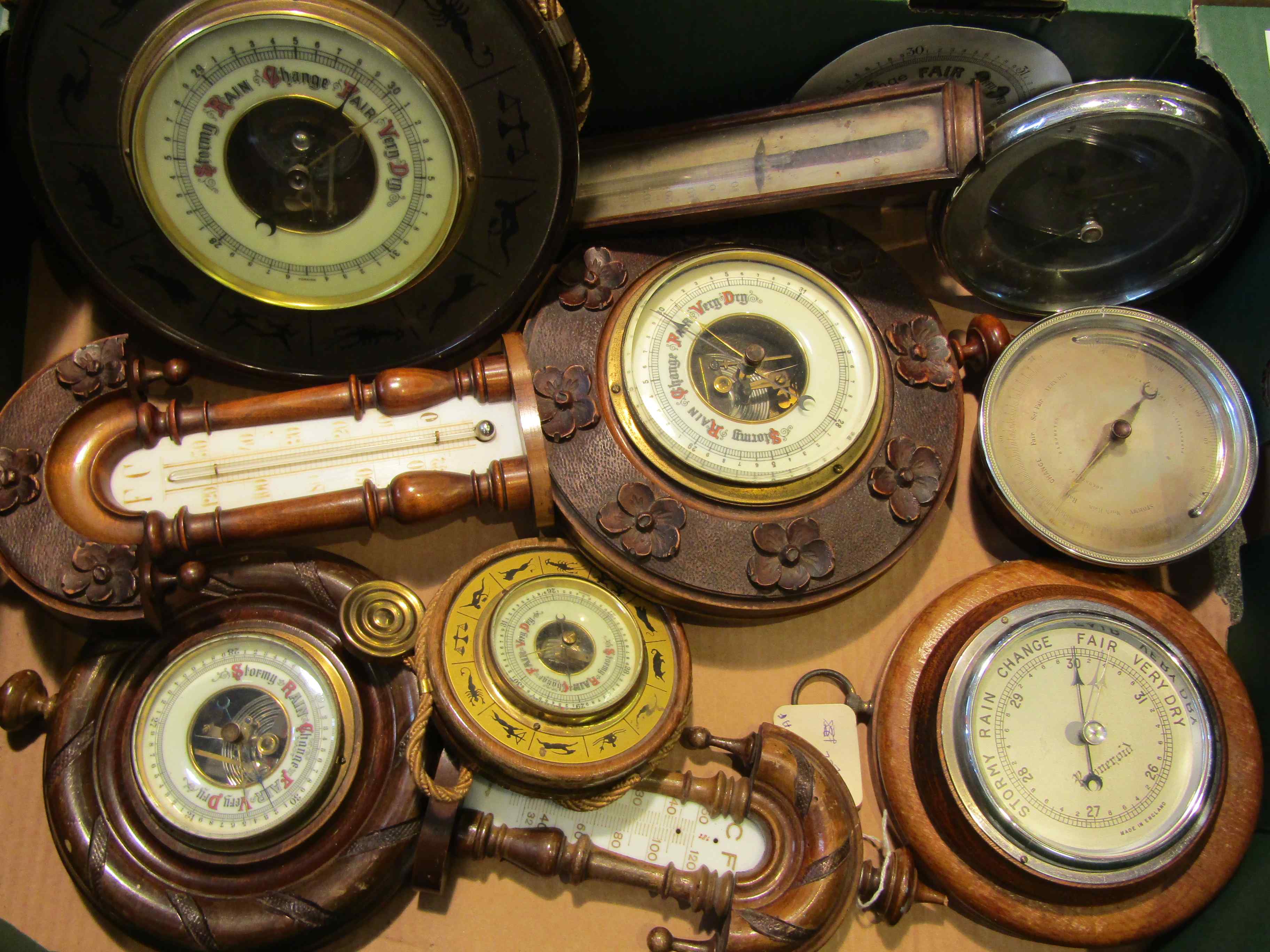 A collection of 20th Century aneroid barometers,