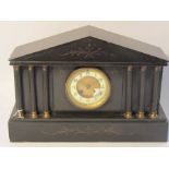 A late 19th Century slate mantel clock of architectural form, Arabic enamelled chapter ring,