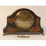 An early 20th Century timepiece with green chinoisserie lacquered case, brass Roman dial,