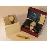 Three lady's quartz watches: Rotary "Rocks" Diamond set,