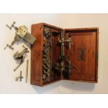 A boxed early to mid 20th Century 6mm watchmaker's lathe,