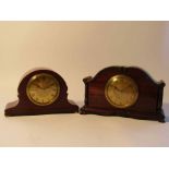 Two Edwardian mahogany timepieces of Napoleon hat and architectural form,