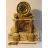 A late 19th Century large onyx French mantel clock of architectural form with gilt column supports