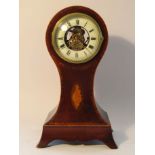 A rare Edwardian Eureka clock of balloon form in mahogany and crossbanded case with shell cartouche