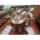 A Victorian copper kettle