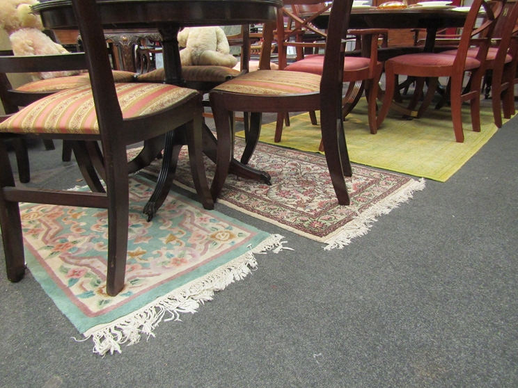 Two Chinese flower design floor rugs,