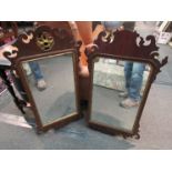Two mahogany carved and gilded pier mirrors,