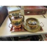 A planished copper oblong tray and three pieces of brassware including twin handled urn (4)