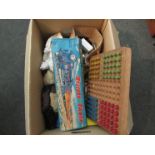 A box containing a collection of vintage and modern toys including "Western Train",
