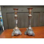A pair of Art Nouveau silver plated on copper candlesticks,