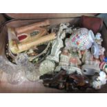 A suitcase of miscellaneous including Staffordshire figures