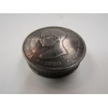 A metal miniature powder compact with coin top