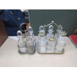 Two silver plated and glass cruet sets