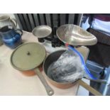 Two copper pans and a set of kitchen scales