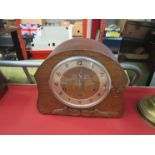 A 1930's oak cased mantel clock,