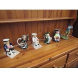 Five character jugs including Kevin Francis,
