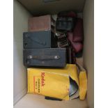 A box of optical equipment including Kodak no.