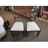 A set of six Victorian balloon back chairs with blue upholstered drop in seats