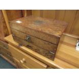 A late Victorian walnut writing box with gilt cartouche dated 1884, fitted interior,