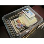 A box of mixed postcards